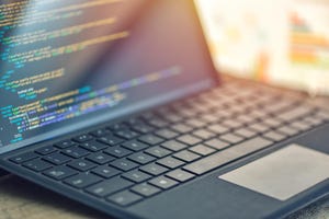 coding on laptop